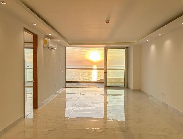 Bran new beachfront condo for sale